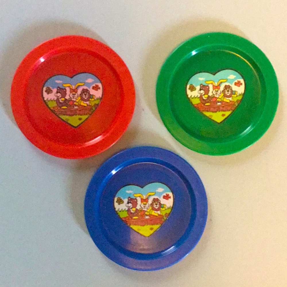 Set of three kids play plates from the 90s